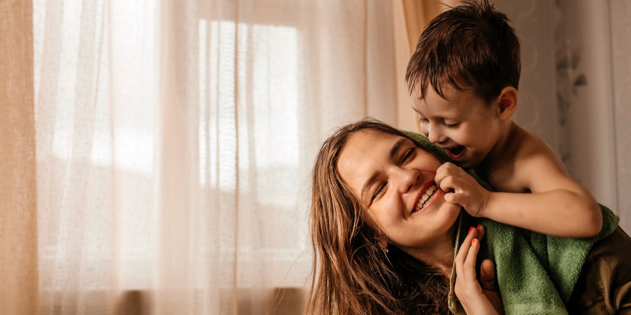 Mother hugging child
